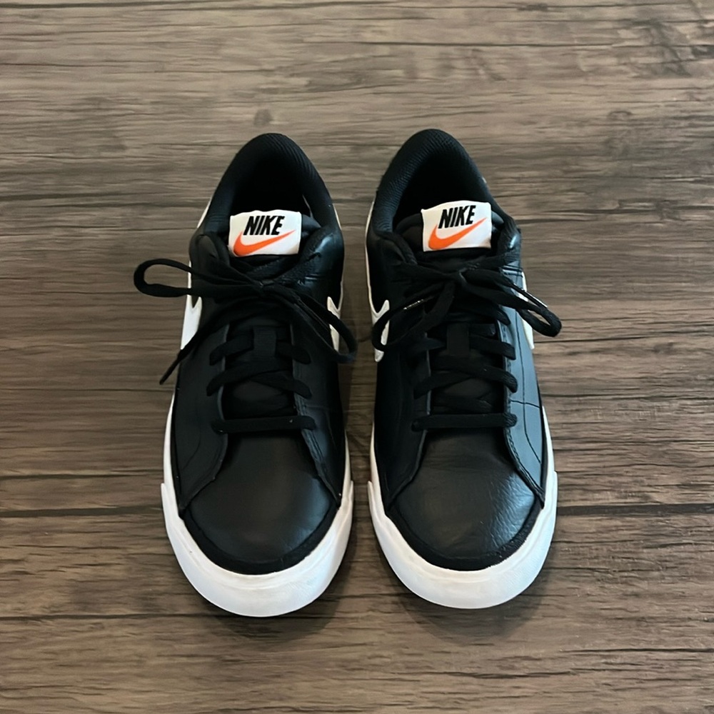 Kids Size 5 Black Nikes.